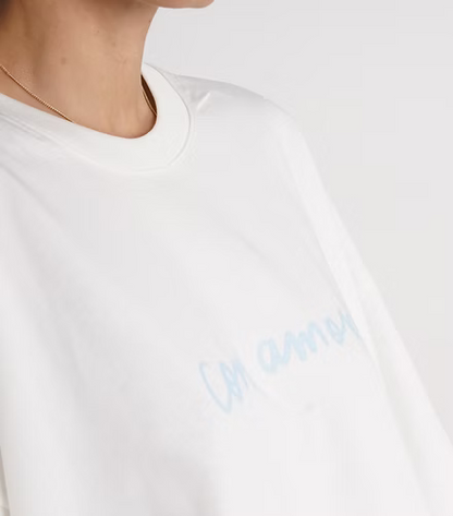 Camiseta Oversized color crema estampado azul